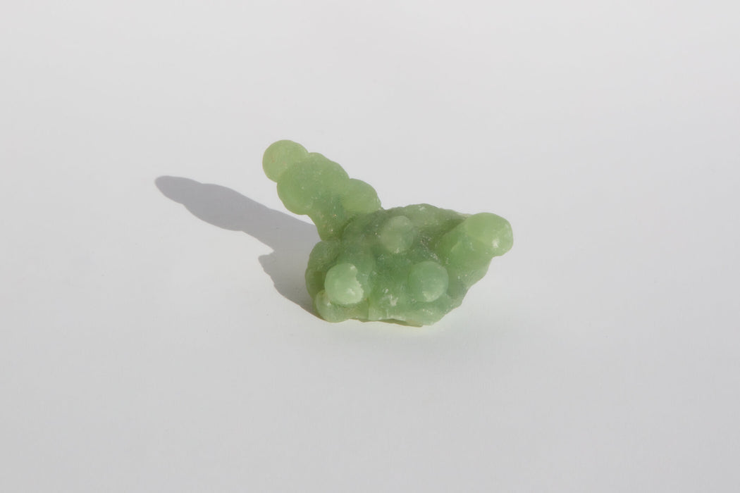 3: 2.25 x 3.5 x 1.63 inches - 132 g - $400 | This one has a dome of epidote beneath the crystal!