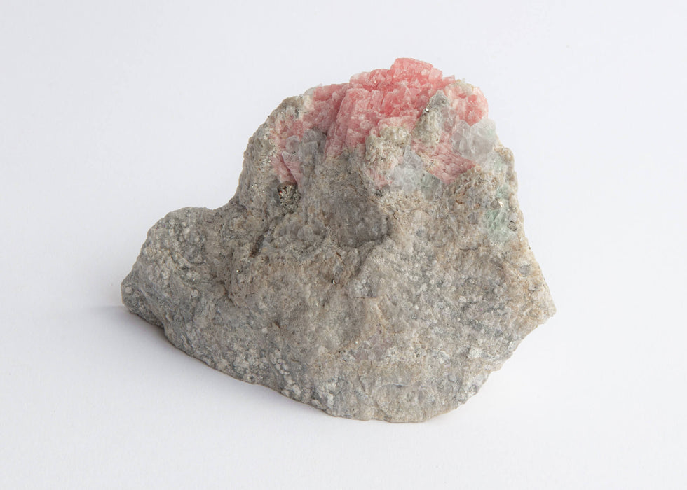 1: 2.5 x 5 x 2.43 inches - 1.2 lbs - $530. More intensely pink than in the photos. Very gemmy. Large pyrite chunks with quartz intespersed throughout.