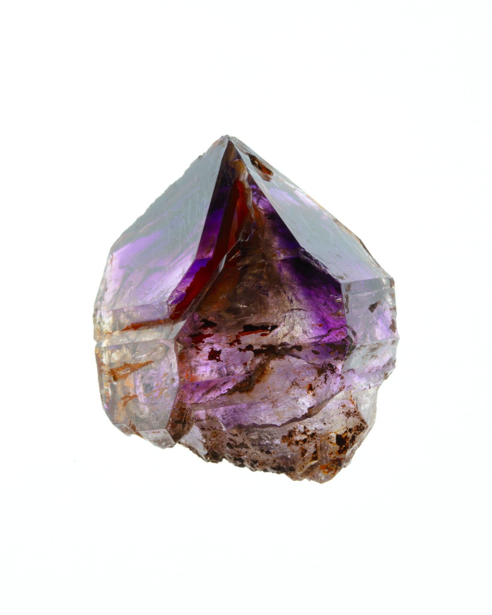 2: 1.42 x 1.66 x 1 inches - 42 g - $500 | Contains phantoms deeply within the crystal. Slightly chipped, but a very intensely hued smoky amethyst. A powerful stone.