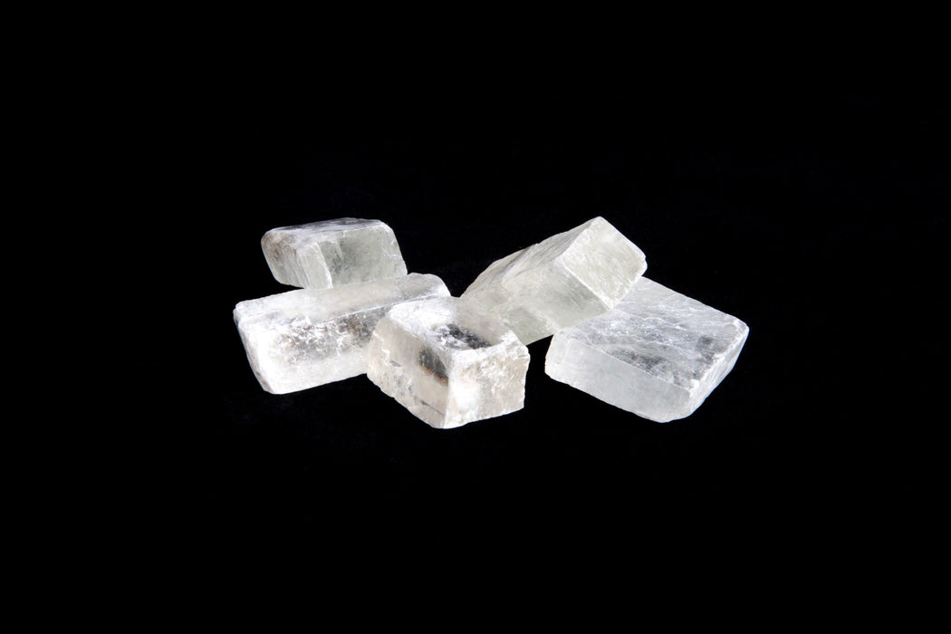 Rhomboid clear calcite pocket stones
