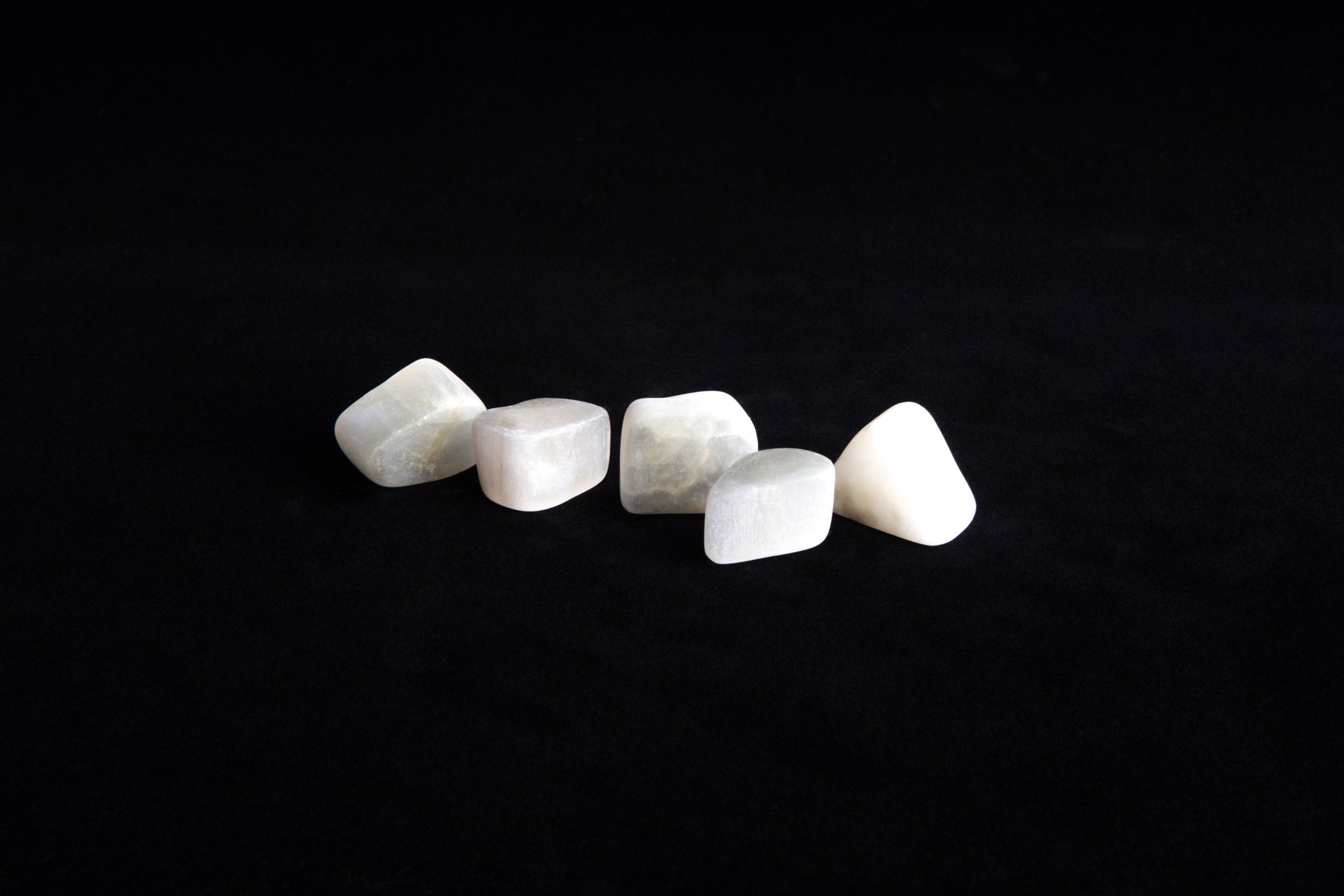 Small sized ulexite pocket stones